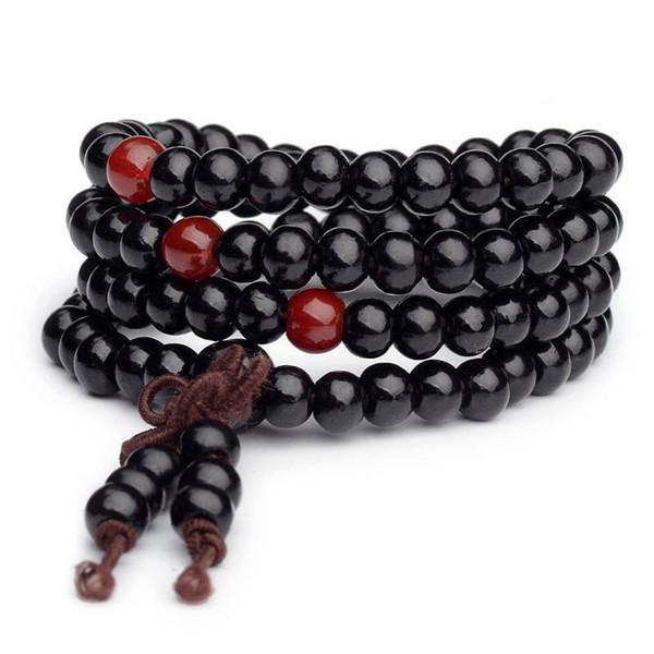 https://www.pranaheart.com/cdn/shop/products/buddhist-black-sandalwood-mala-bracelet-298192_600x.jpg?v=1671197191